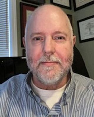 John E Charlton profile image
